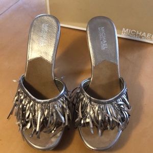 Michael by Micheal Kors fringe wood slide